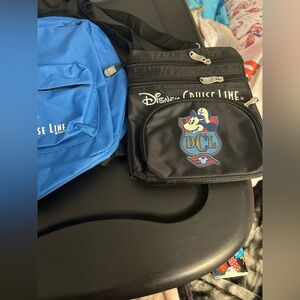 Lot of 2 Disney Cruise line bags. One small backpack and one Crossbody bag